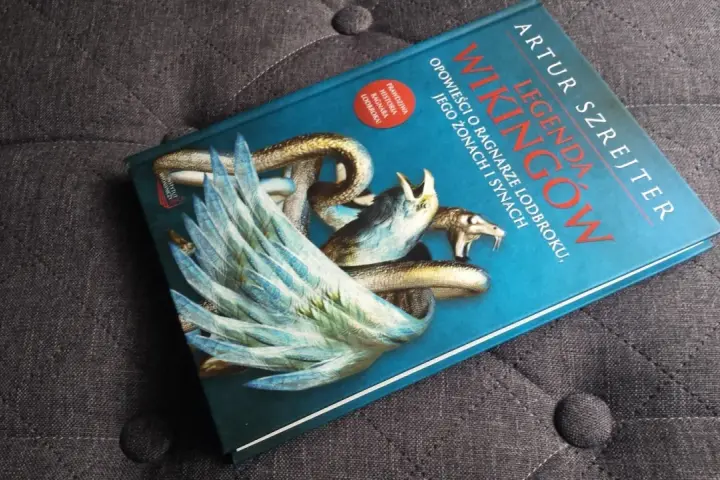 Książki o wikingach: "Legenda Wikingów" Artura Szrejtara z mitycznym stworzeniem na okładce.